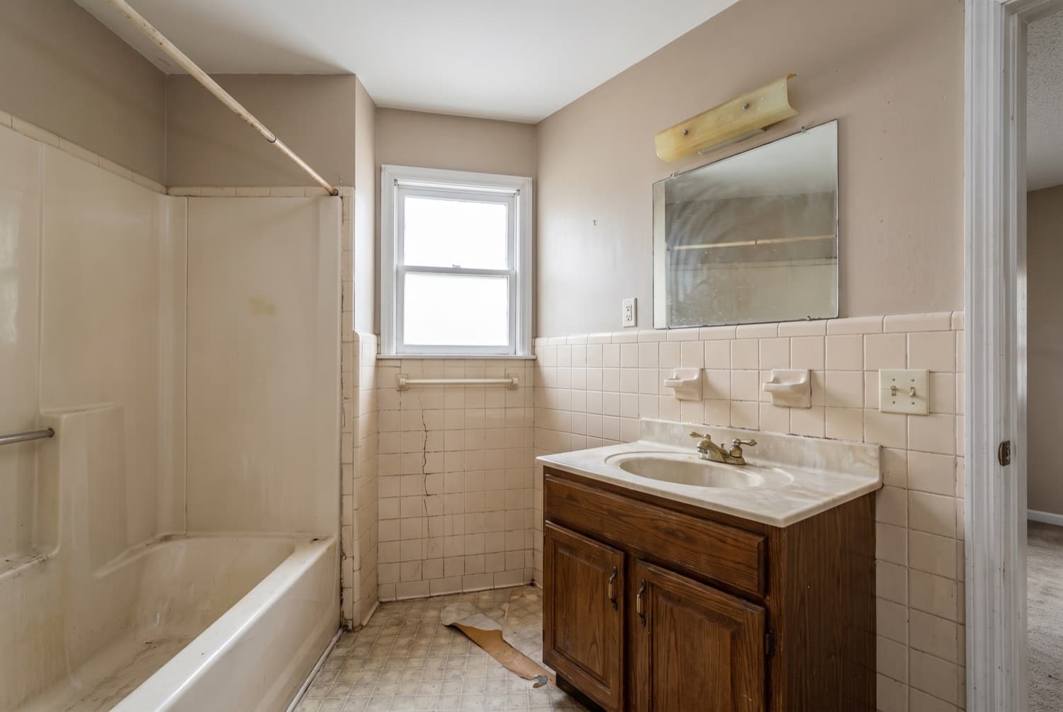 Dated bathroom before renovation by ENF General Contracting