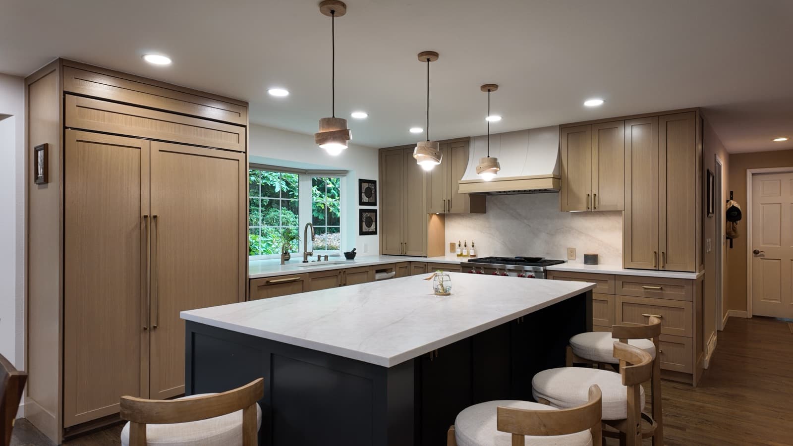 White-oak kitchen remodel with navy island completed by ENF in Bellevue, WA